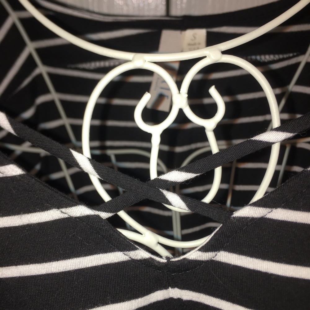 Black and white long sleeve top with cross detail